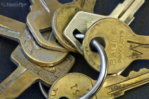 Close-up of several Keys on a keyring | photography, images, and art for hotels, office buildings, homes, restaurants, hospitals, and shopping malls